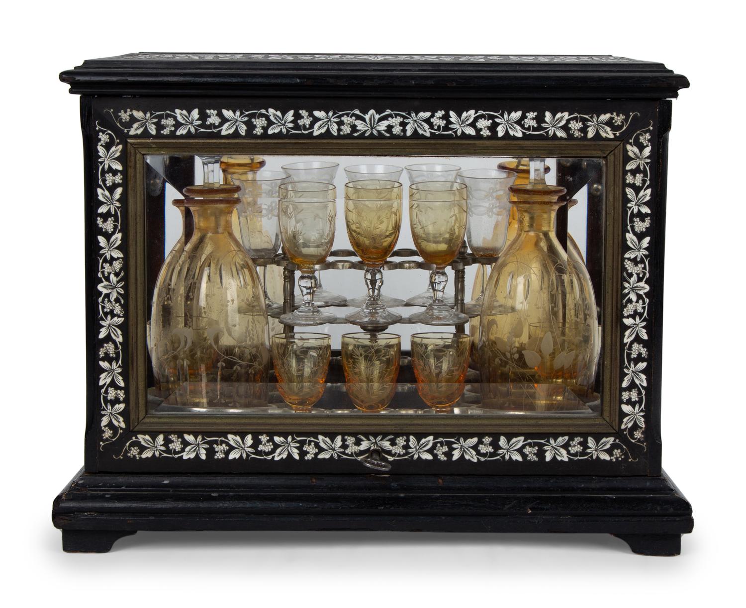 A French Ebonized and Inlaid Cave à Liqueur with Amber Glass Decanters — LATE 19TH CENTURY