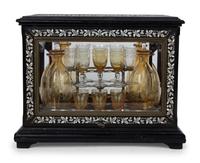 A French Ebonized and Inlaid Cave à Liqueur with Amber Glass Decanters — LATE 19TH CENTURY