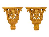 A Pair of George II Style Figural Giltwood Wall Brackets