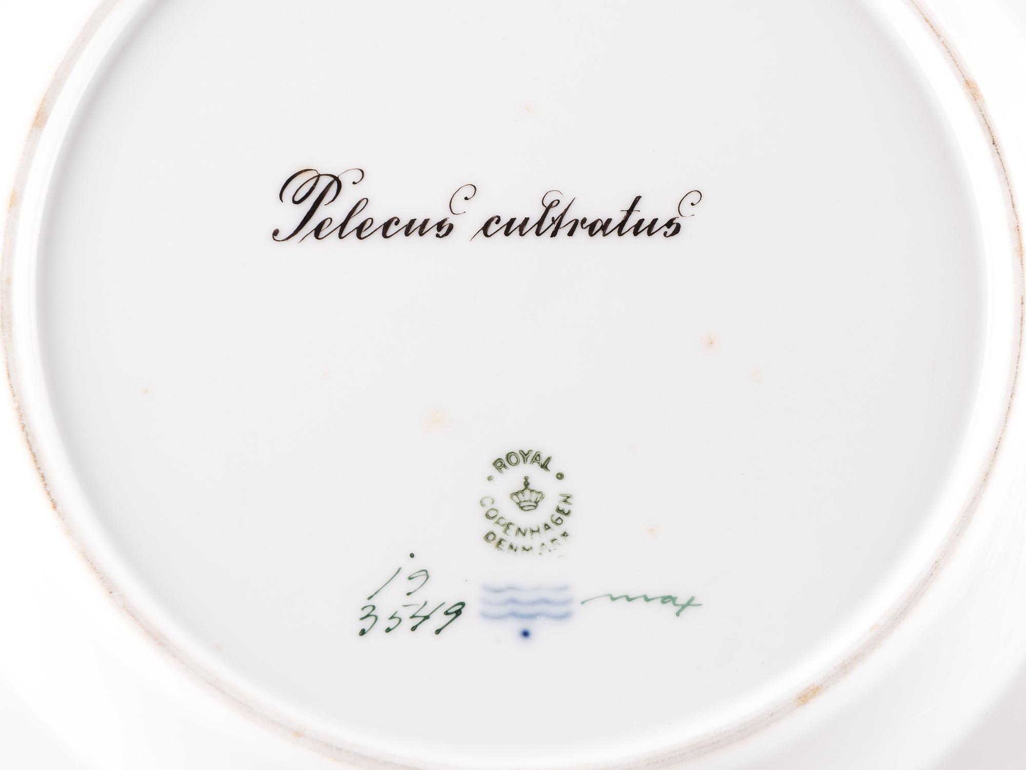 A Set of Twelve Royal Copenhagen Parcel Gilt Porcelain Fish Plates