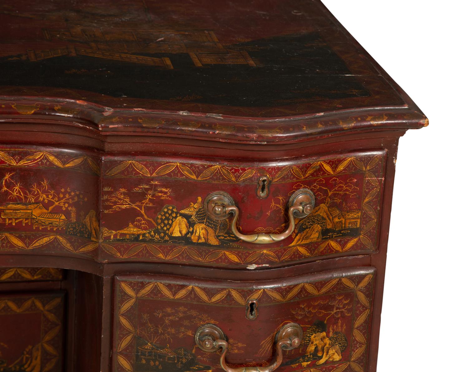 A George III Style Red and Gilt Japanned Knee-Hole Desk