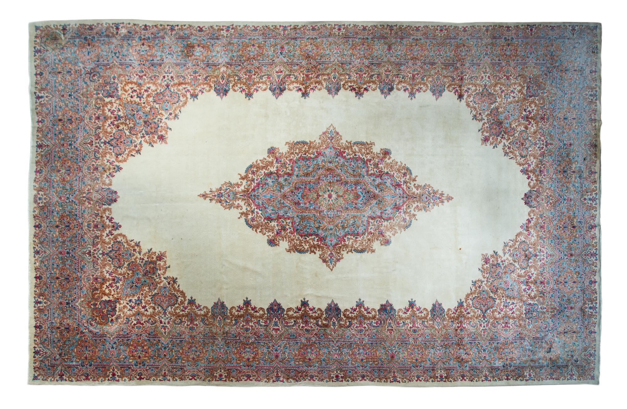 A Kirman Wool Rug 21 feet x 11 feet 6 inches. — MID-20TH CENTURY