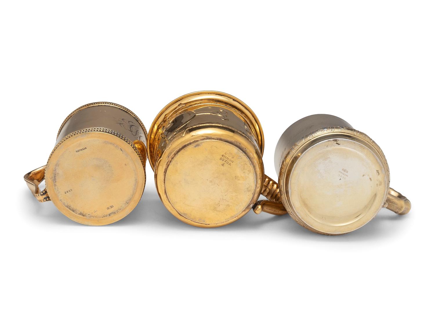 Three American Silver-Gilt Mugs