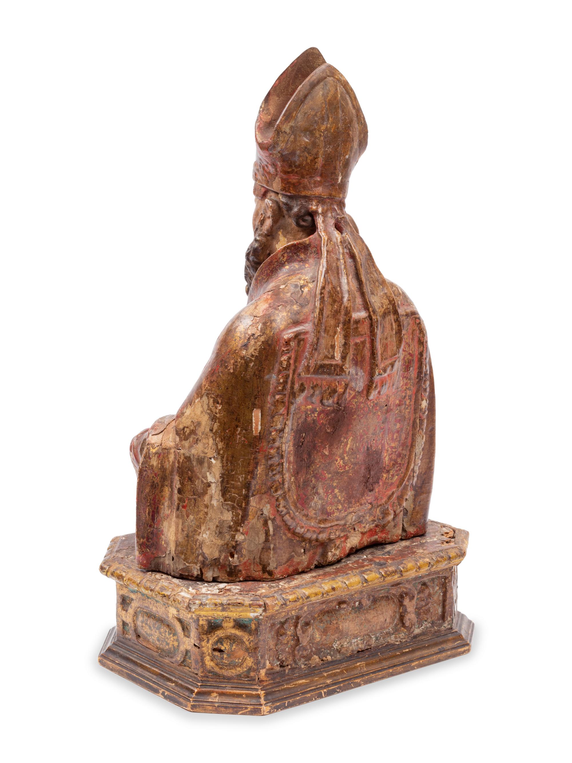 A Continental Painted and Parcel Gilt Bust of a Saint