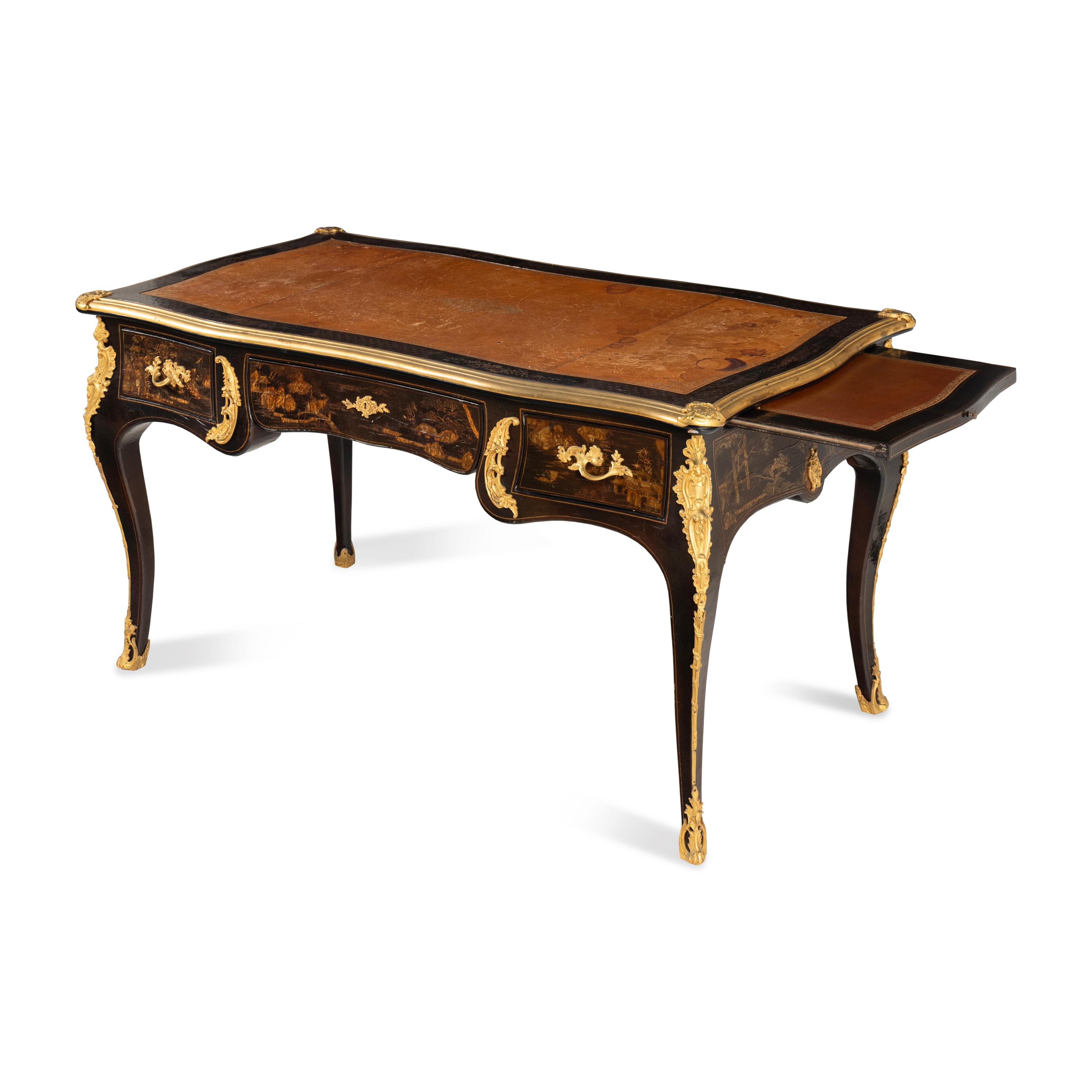 A Louis XV Style Black Lacquer and Gilt Bronze Mounted Bureau Plat