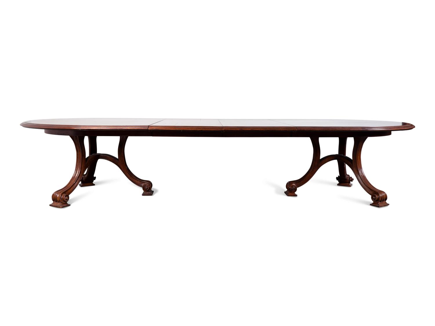 A Carved Walnut Two Pedestal Banquet Table by Therien Studio Workshops — 20TH CENTURY