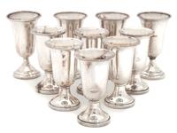 An Assembled Set of Ten Silver Cordials Height of tallest 3 1/4 inches.