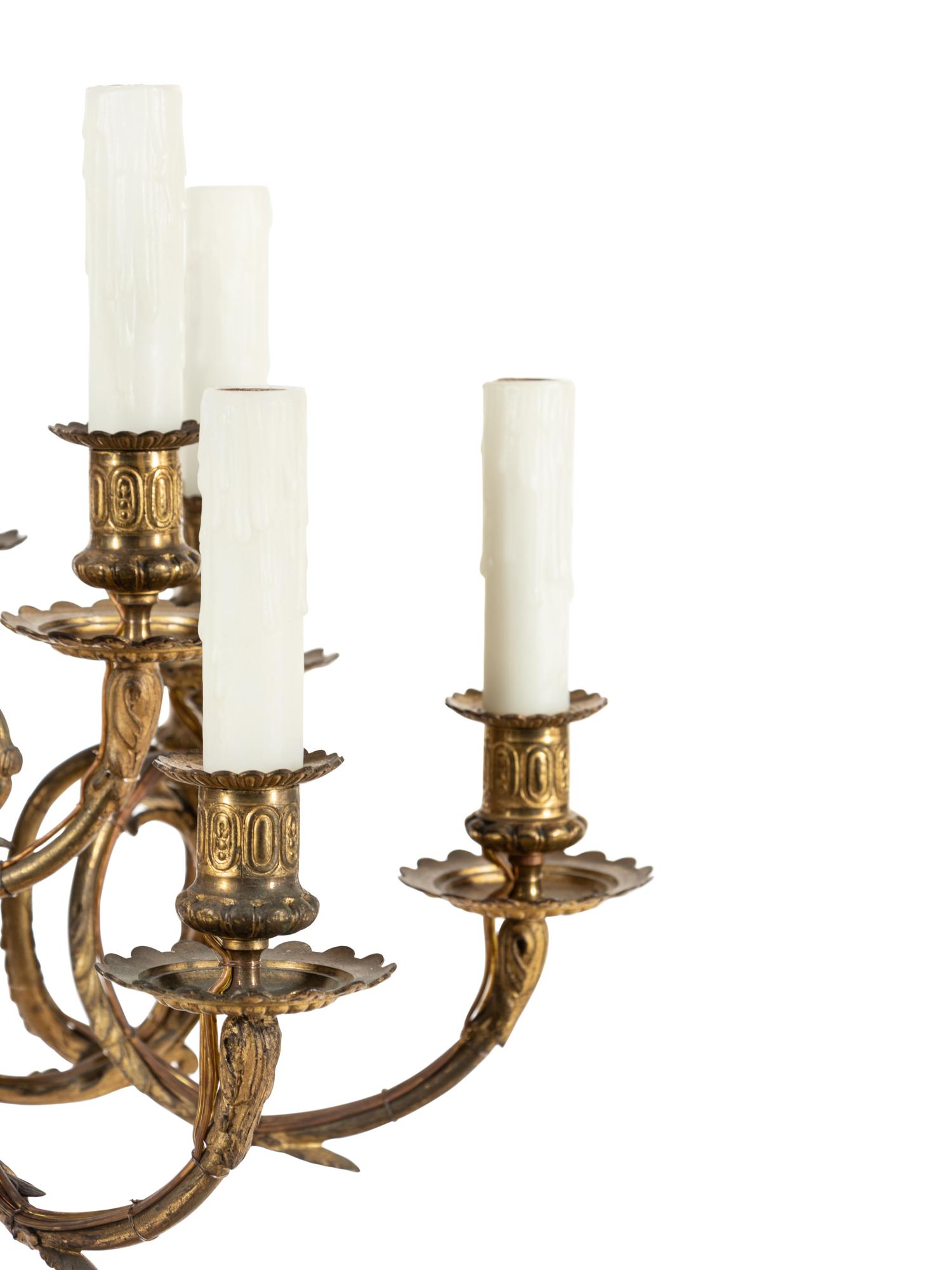A Louis XVI Style Gilt Bronze Sixteen-Light Chandelier