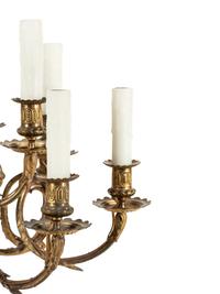 A Louis XVI Style Gilt Bronze Sixteen-Light Chandelier