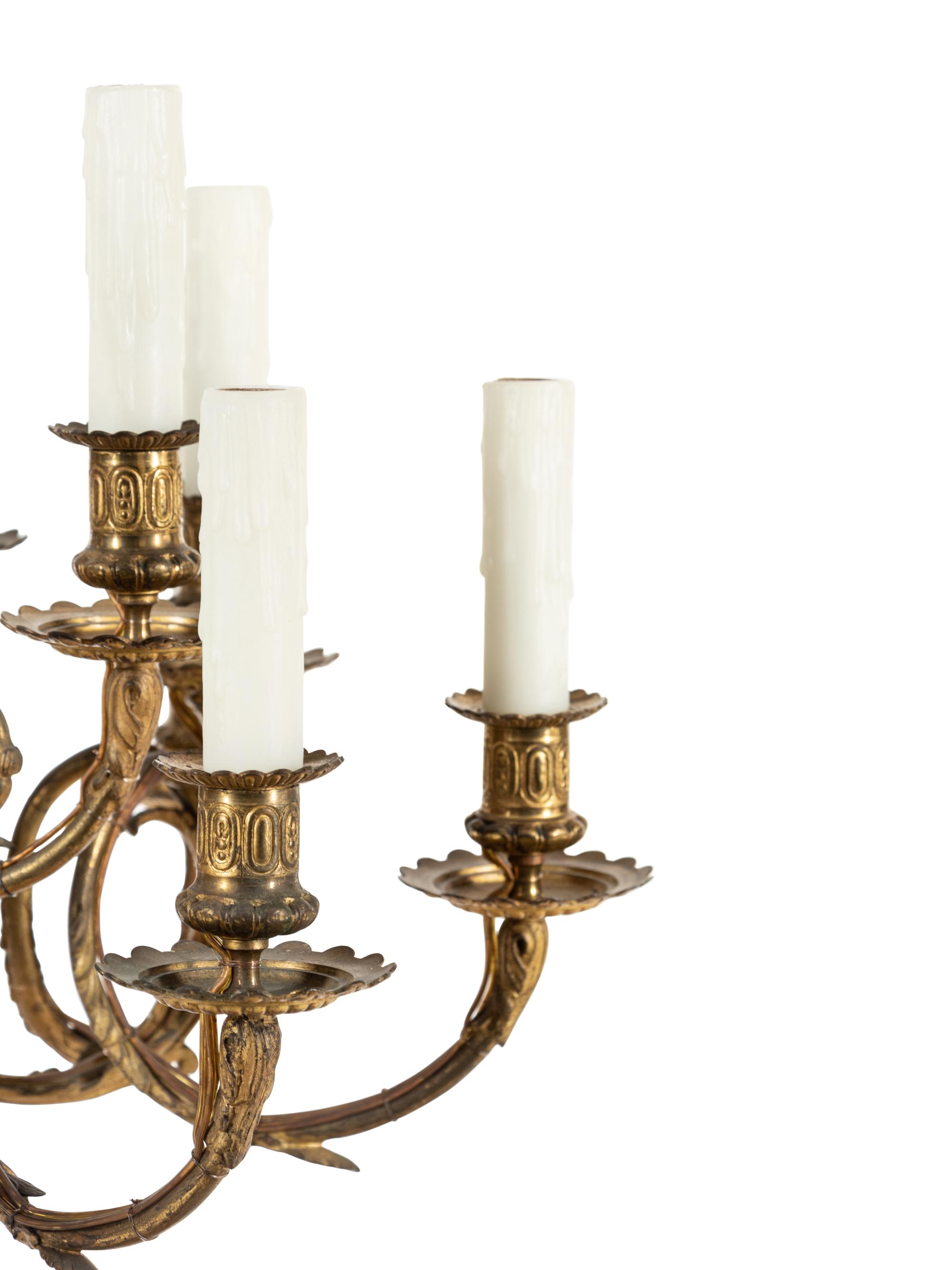 A Louis XVI Style Gilt Bronze Sixteen-Light Chandelier