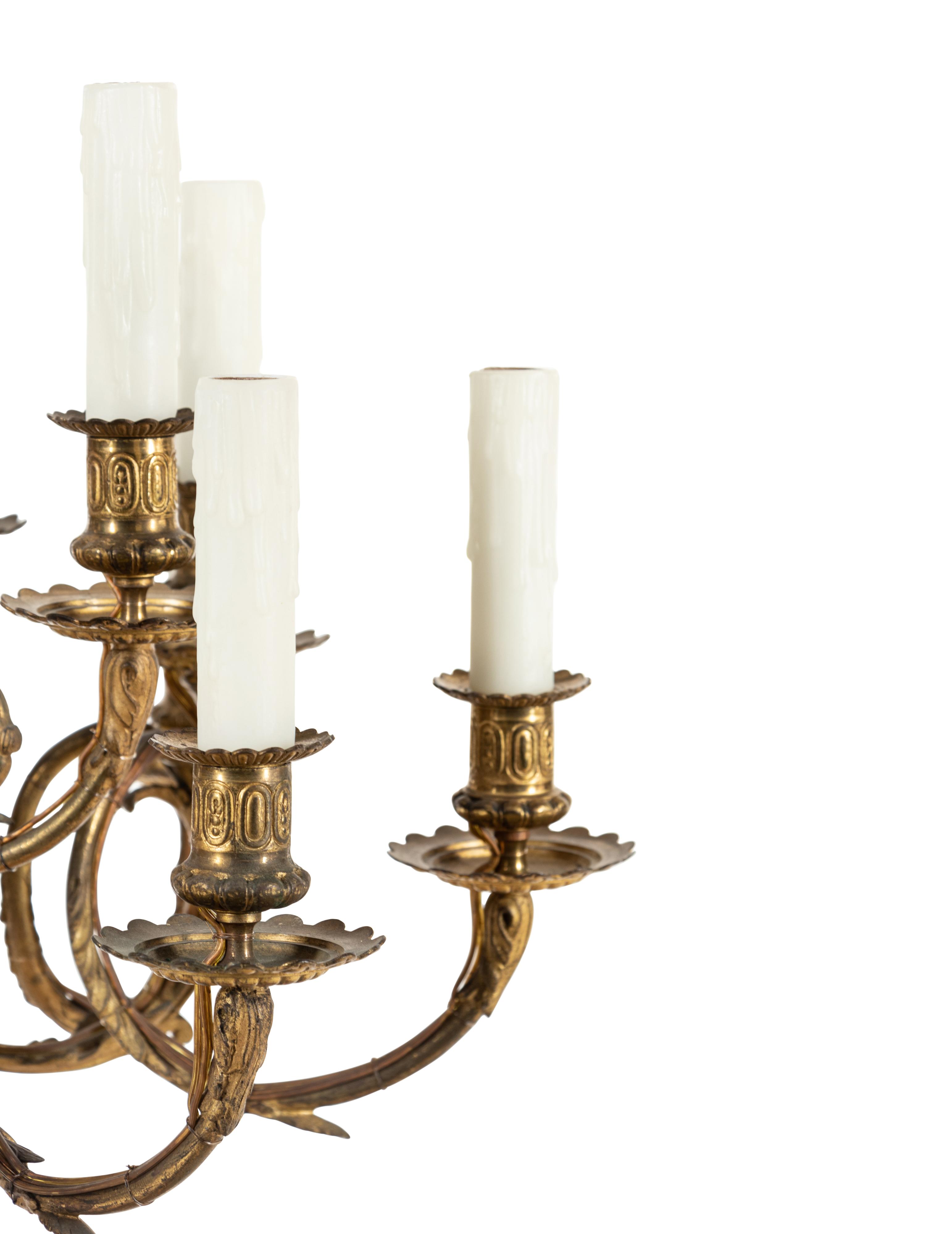 A Louis XVI Style Gilt Bronze Sixteen-Light Chandelier