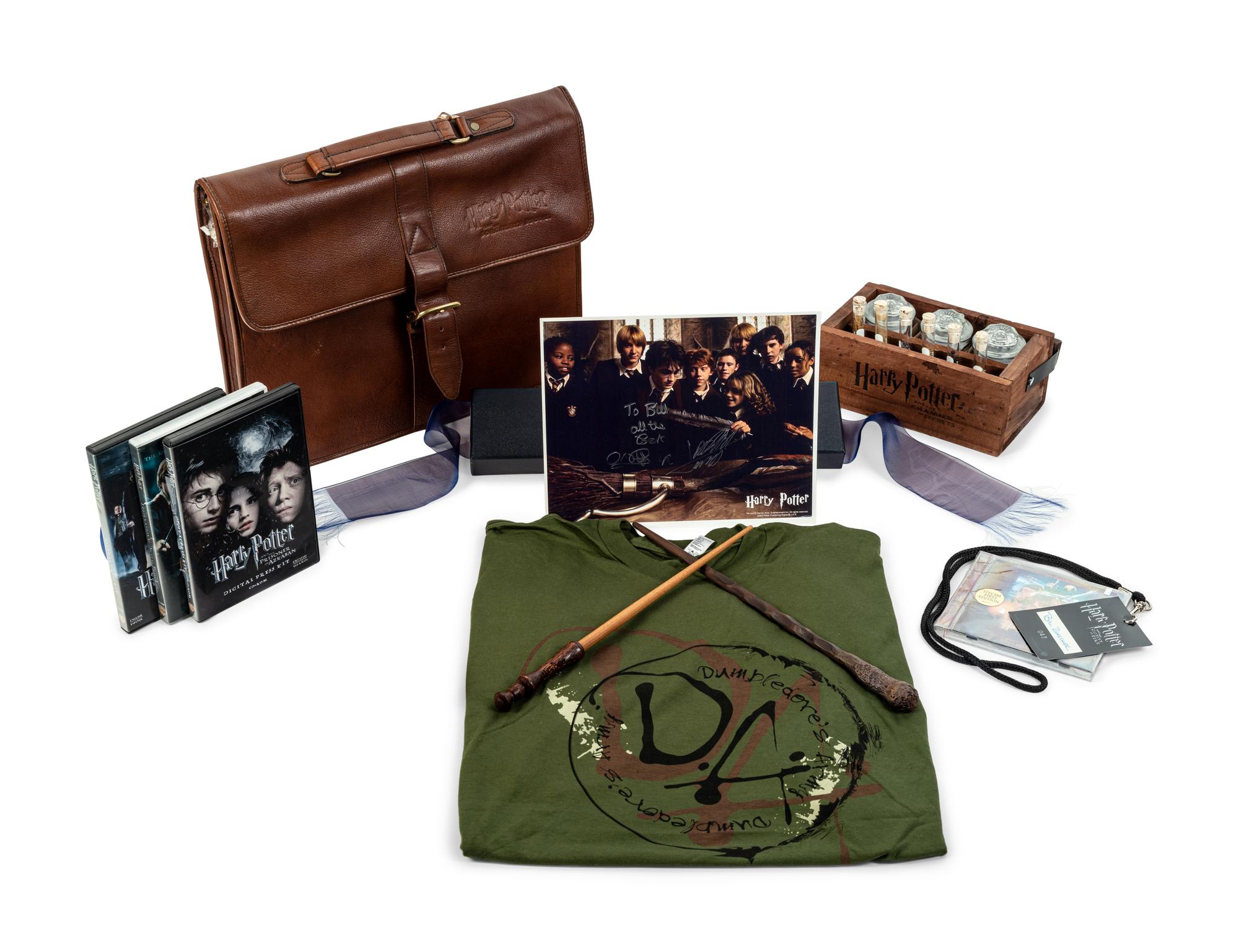 (Film Memorabilia) A group of 14 pieces of memorabilia from the Harry Potter film franchise, comprising: