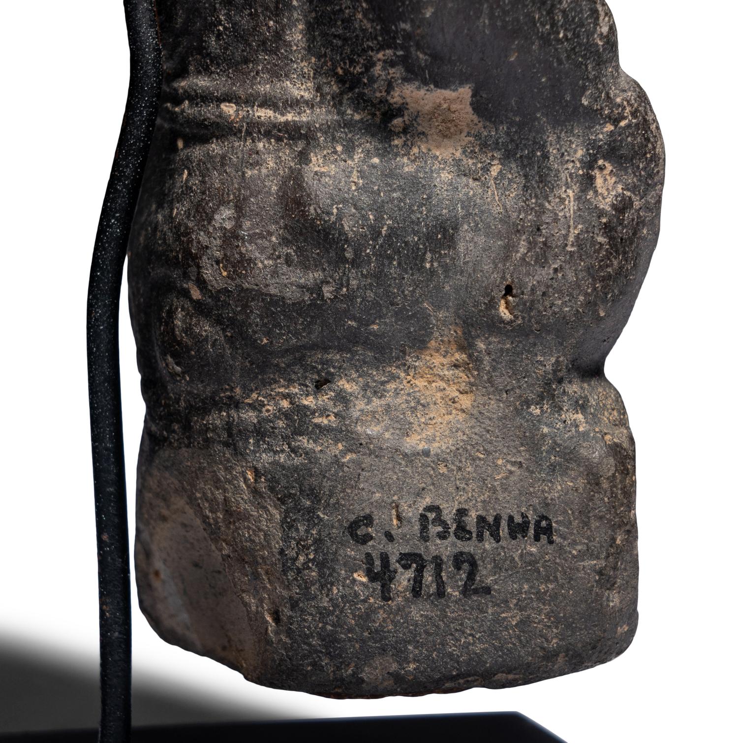 An Egyptian Terracotta Vessel in the form of Bes