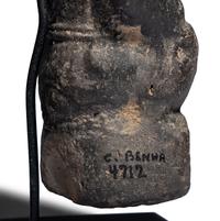 An Egyptian Terracotta Vessel in the form of Bes