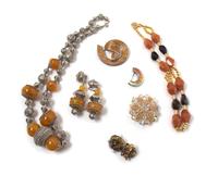 A Group of Orange Tone Costume Jewelry,