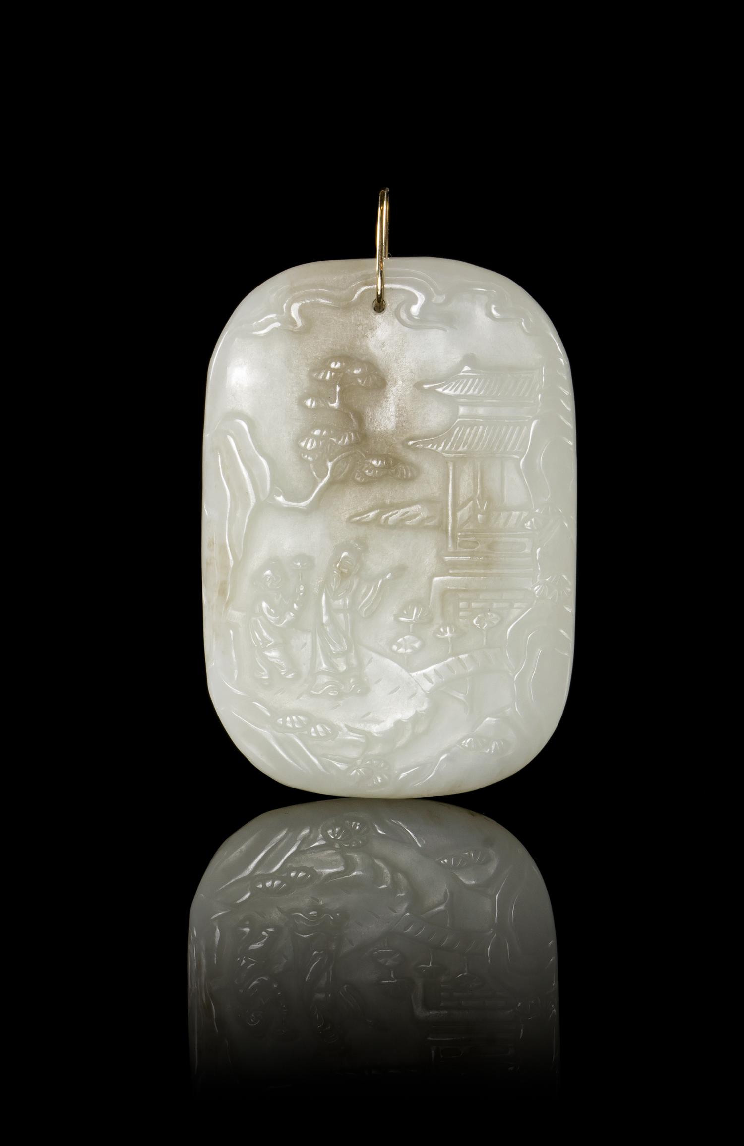 A Carved Jade Plaque Height 2 1/2 inches.