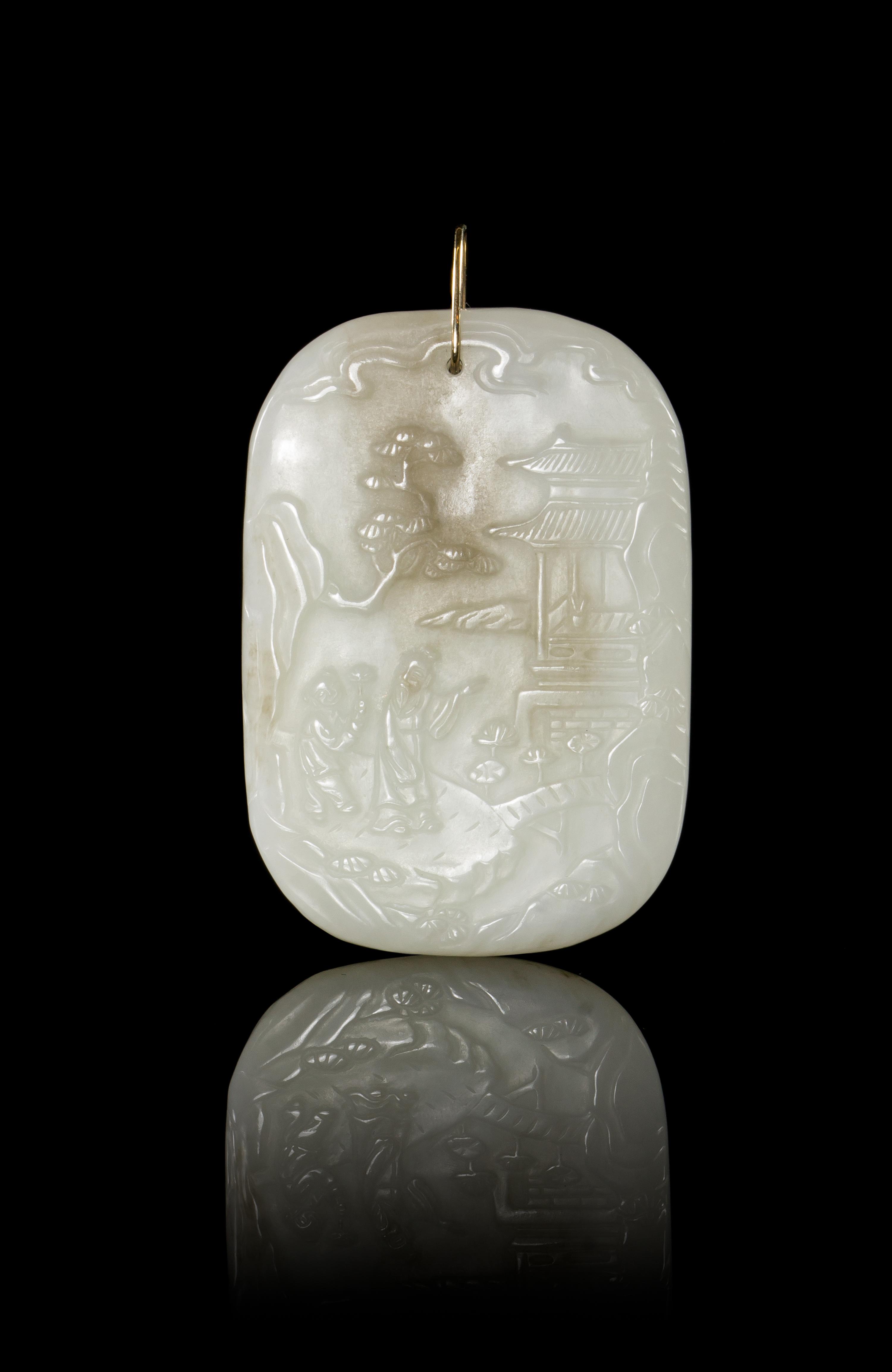A Carved Jade Plaque Height 2 1/2 inches.