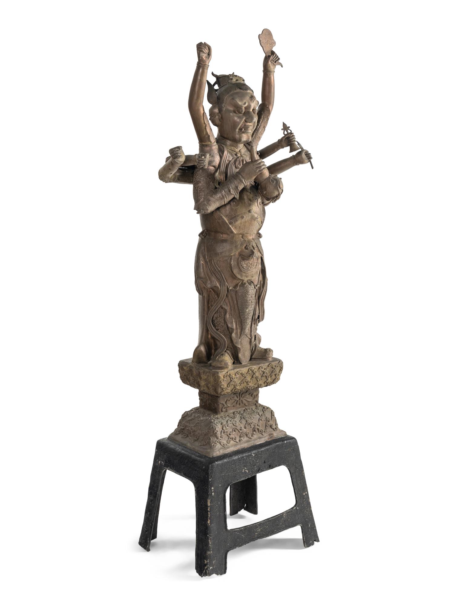 A Large Chinese Bronze Figure of a Deity