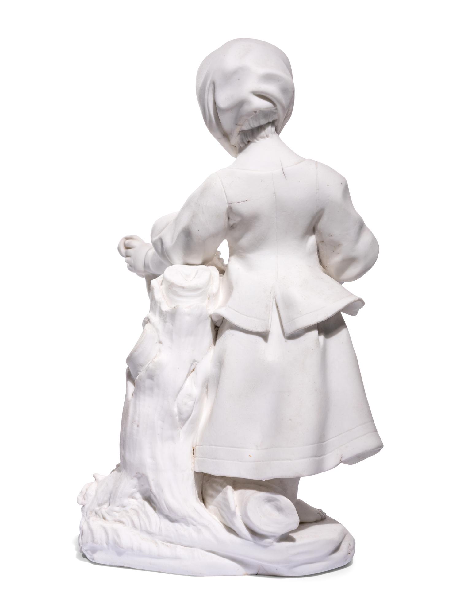 A Sèvres White Biscuit Porcelain Figure of 'La Petit Fille au Tablier'