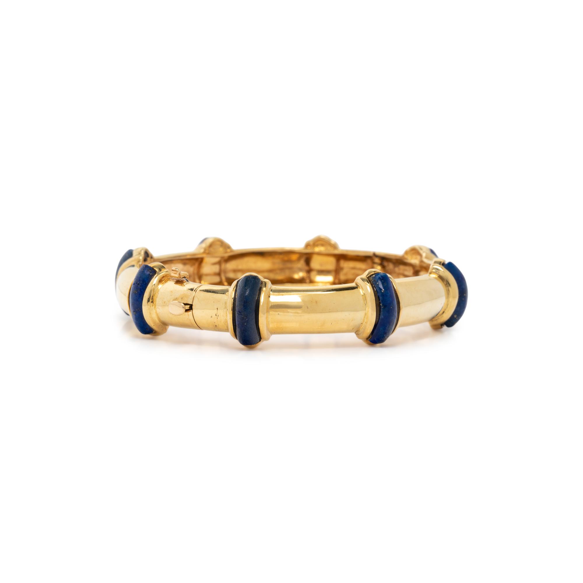 TIFFANY & CO., YELLOW GOLD AND LAPIS LAZULI BANGLE BRACELET