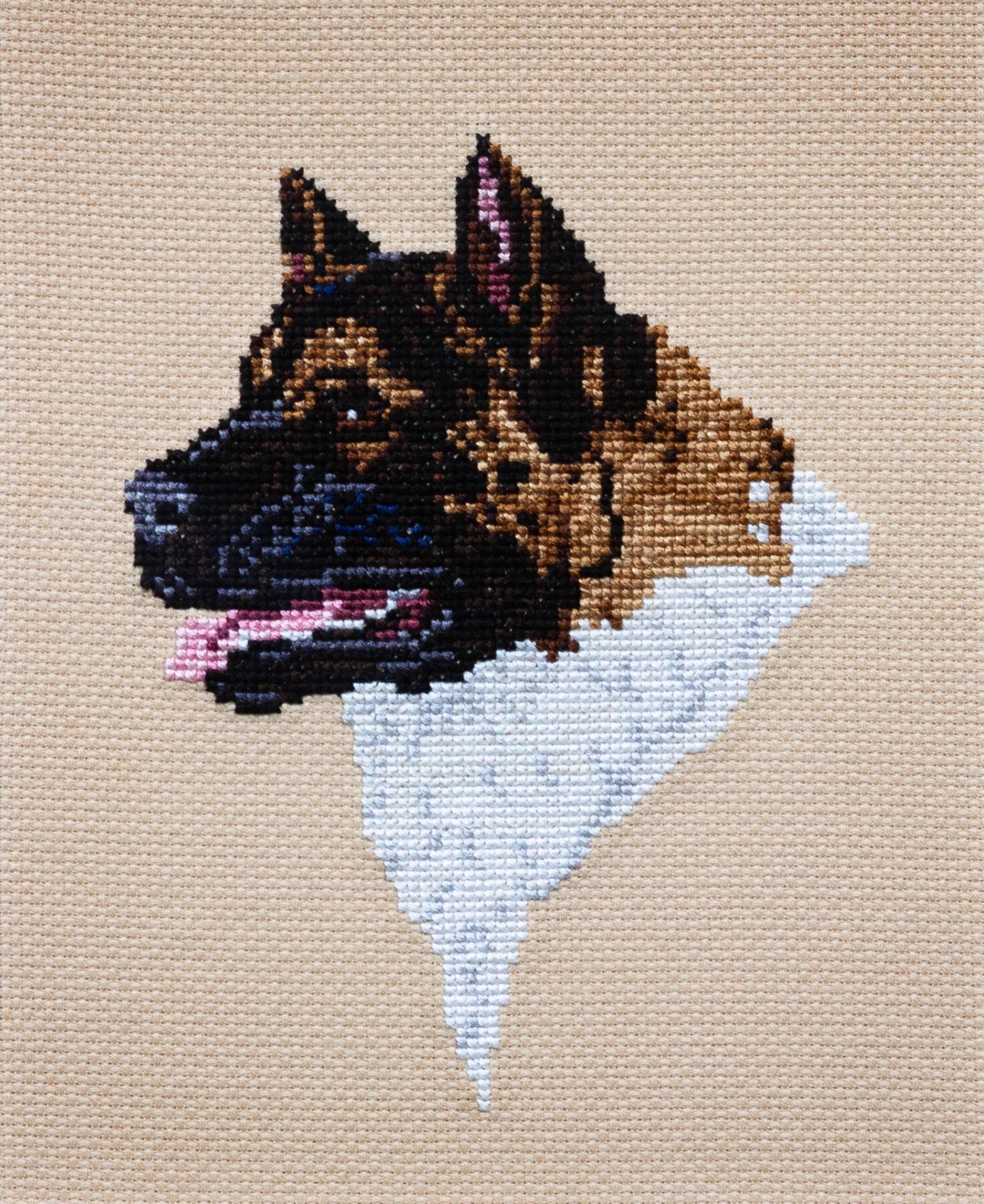 A Cross-Stitch depicting an Akita 8 x 6 1/2 inches.