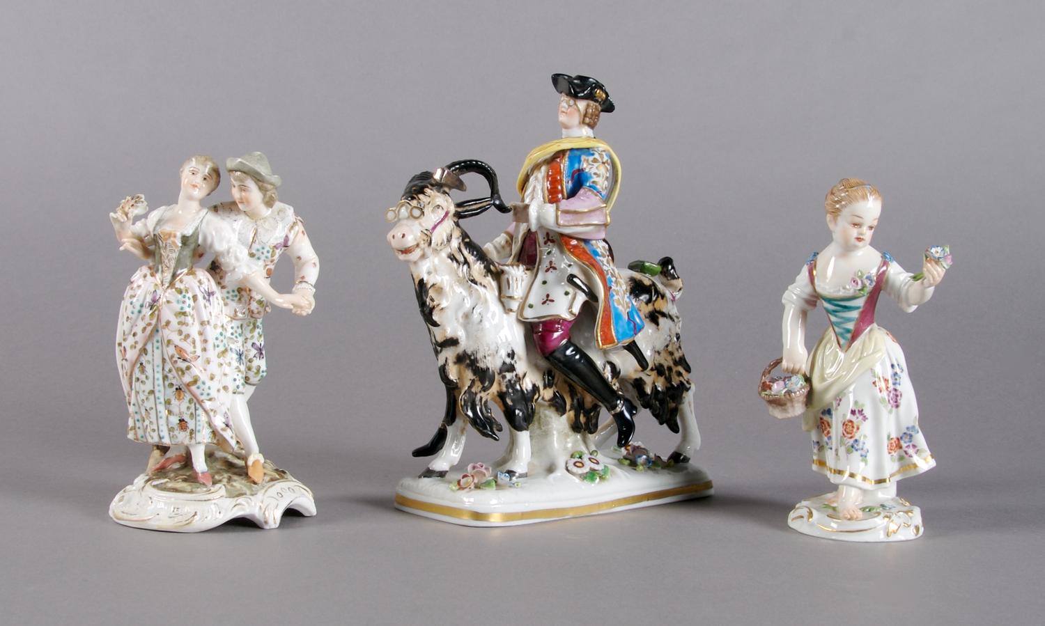 A Meissen Porcelain Figure, Height of first 5 1/4 inches.