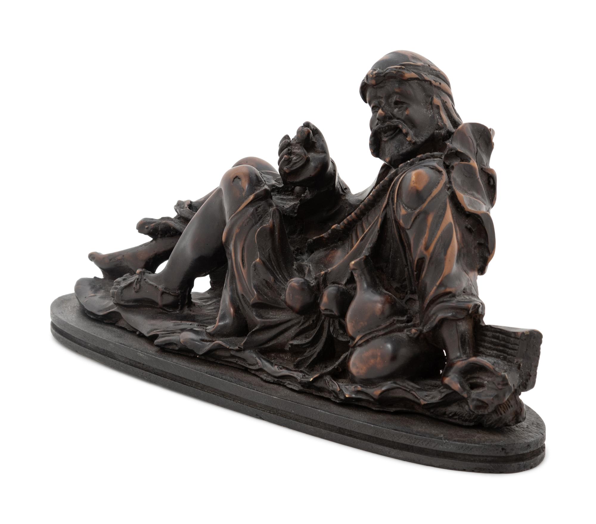 A Chinese Carved Wood Figure of Li Tieguai