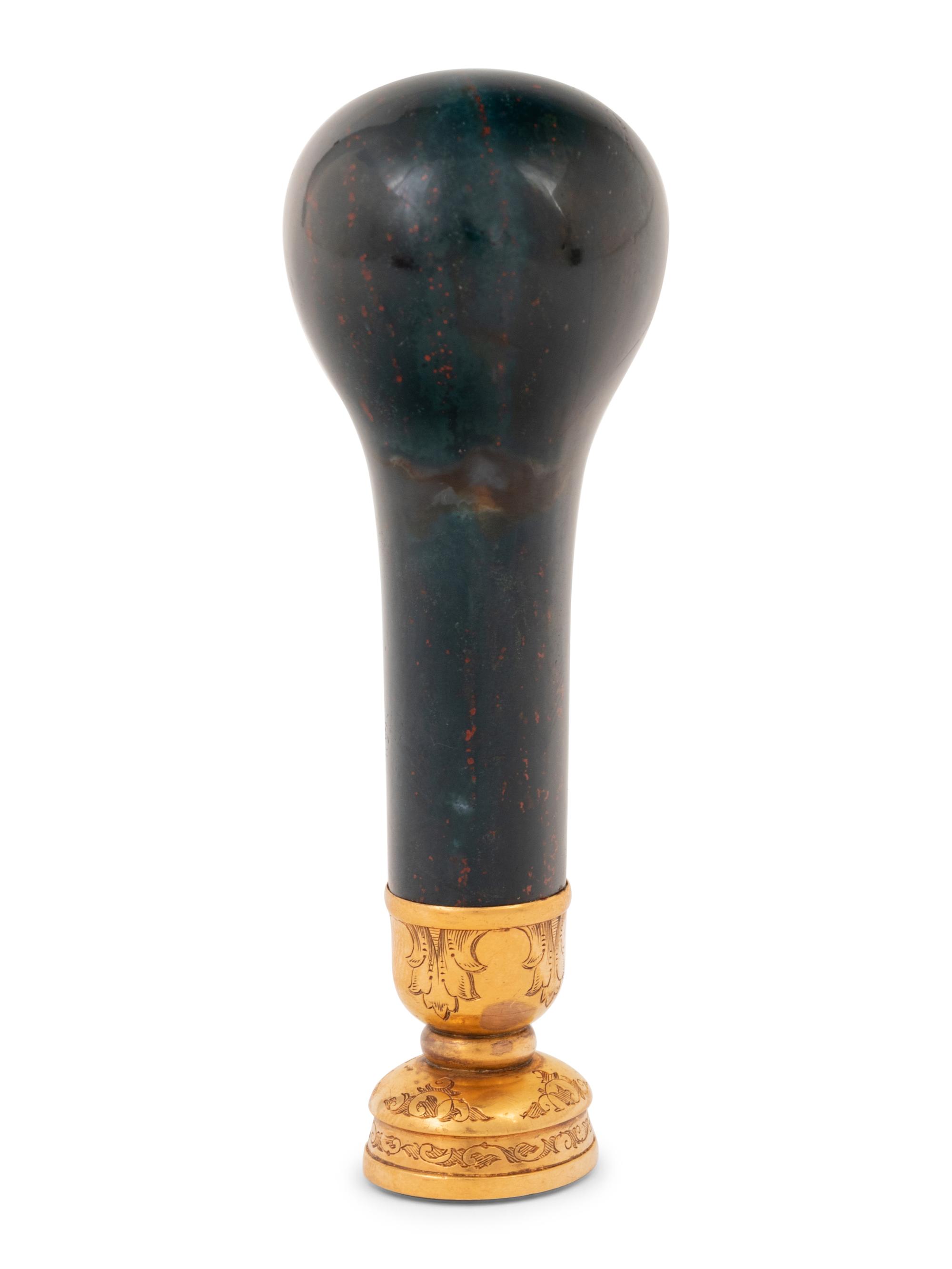 A Continental 18-Karat Gold-Mounted Bloodstone Hand Seal