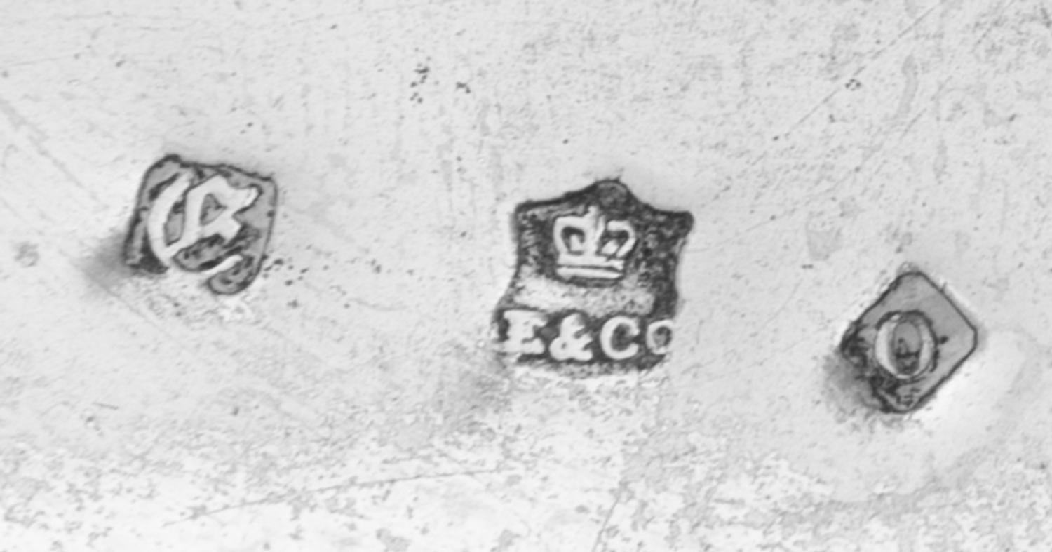 A Pair of English Silver-Plate Chambersticks, Elkington & Co., Birmingham, 19th Century, each of shaped circular form.