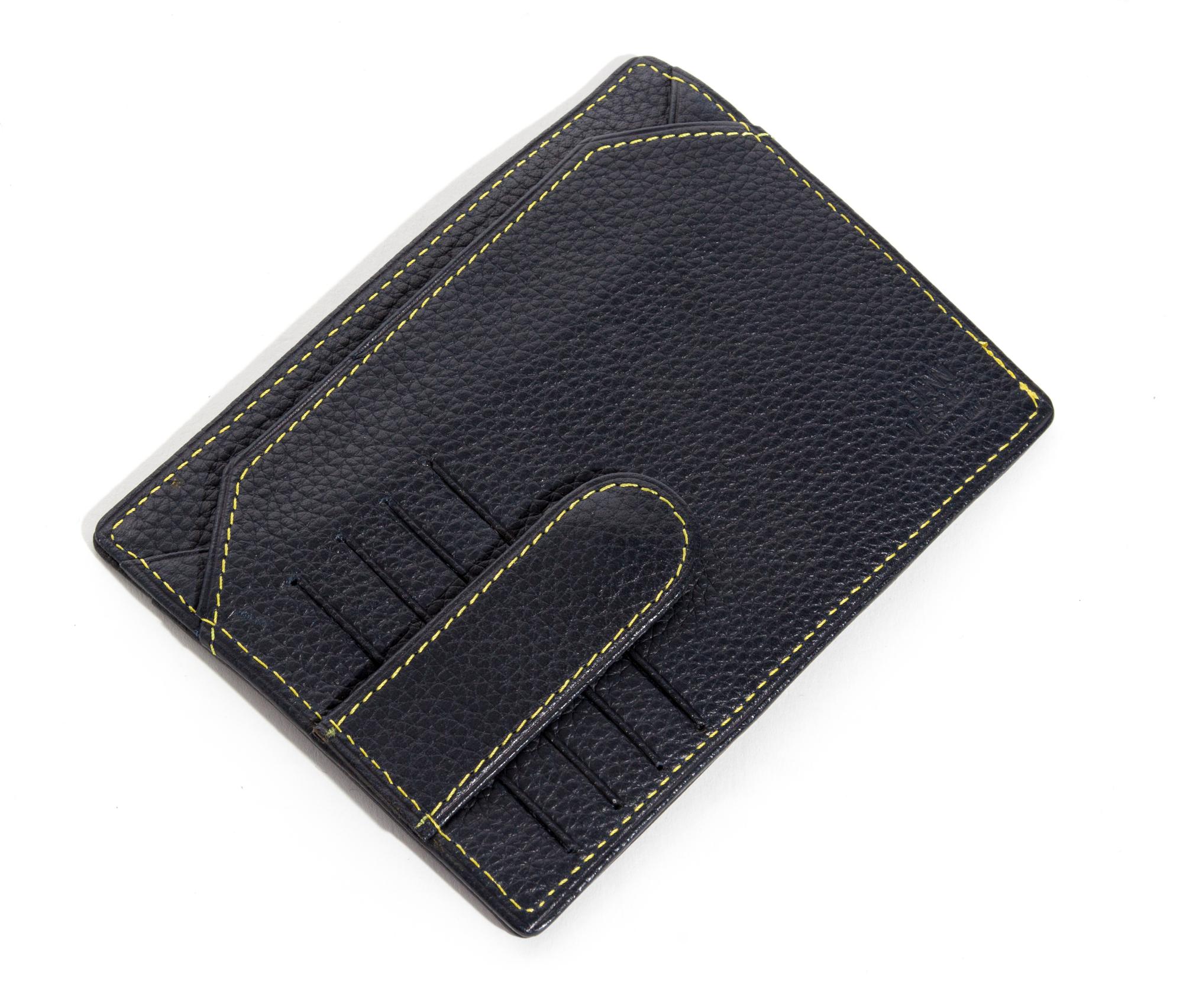 A Gianni Versace Black Embossed Leather Wallet, 4.47" x 3.5".