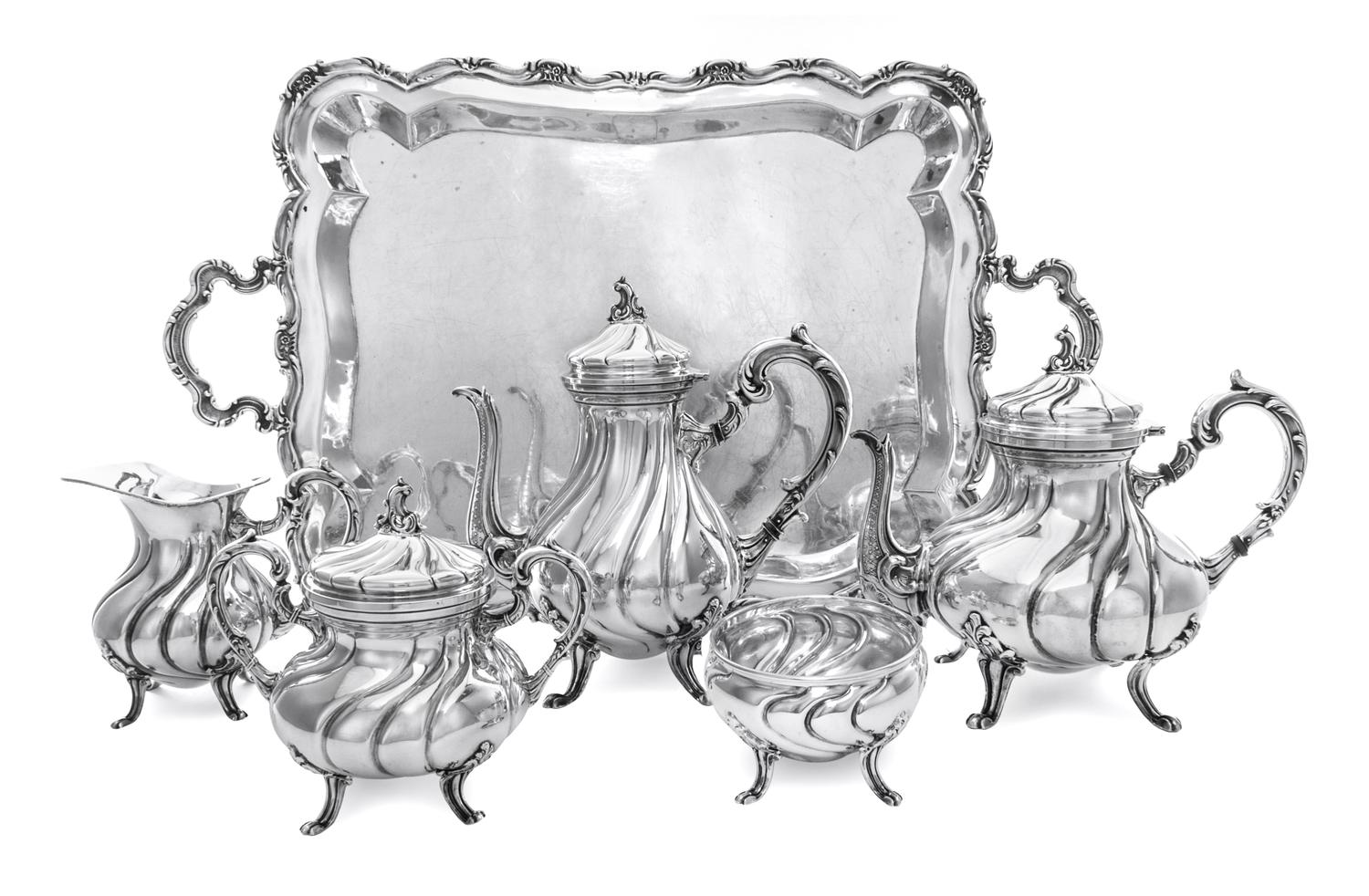 A Peruvian Silver Six-Piece Tea Service, Industria Peruana-Plata Estruina, 20th Century, comprising a teapot, coffee pot, covered sugar
