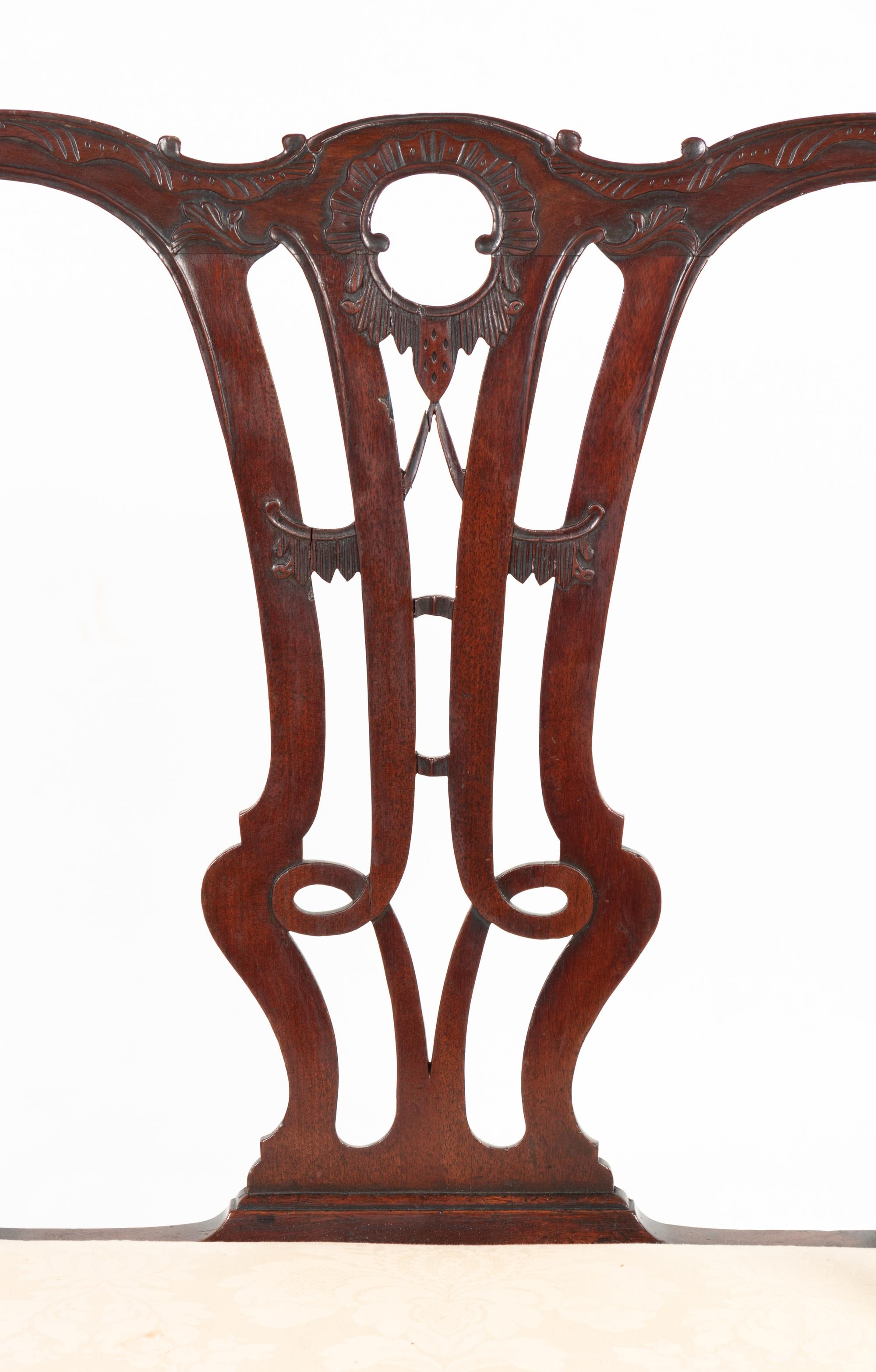 A George III Style Carved Mahogany Double-Back Settee