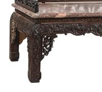 A Chinese Carved Hardwood Four-Piece Furniture Suite