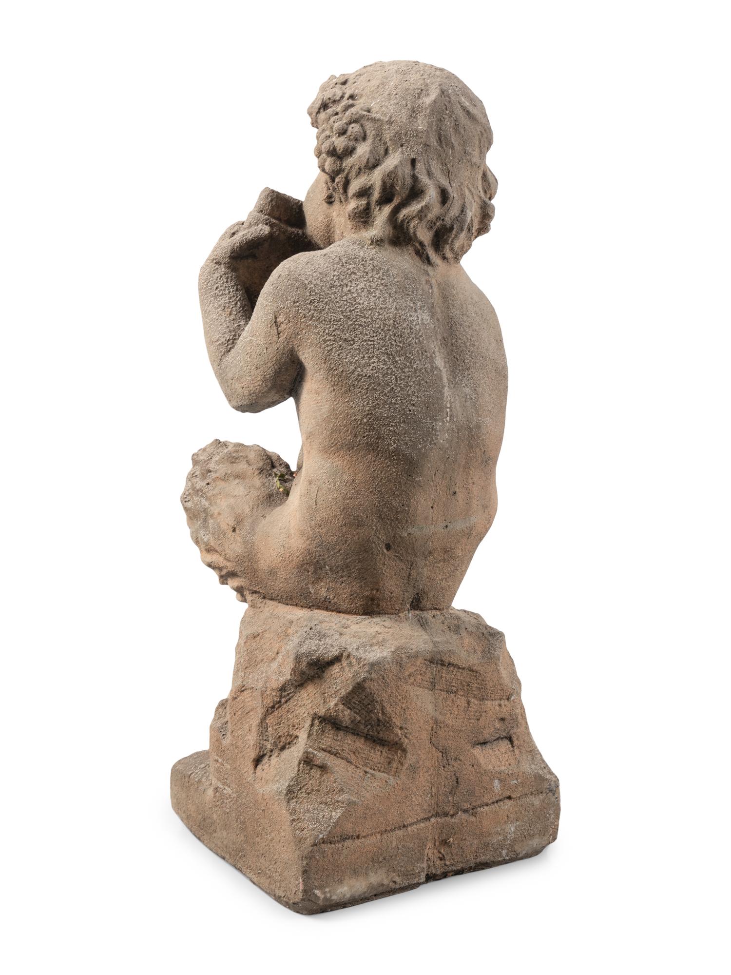 A Carved Limestone Figure of Pan