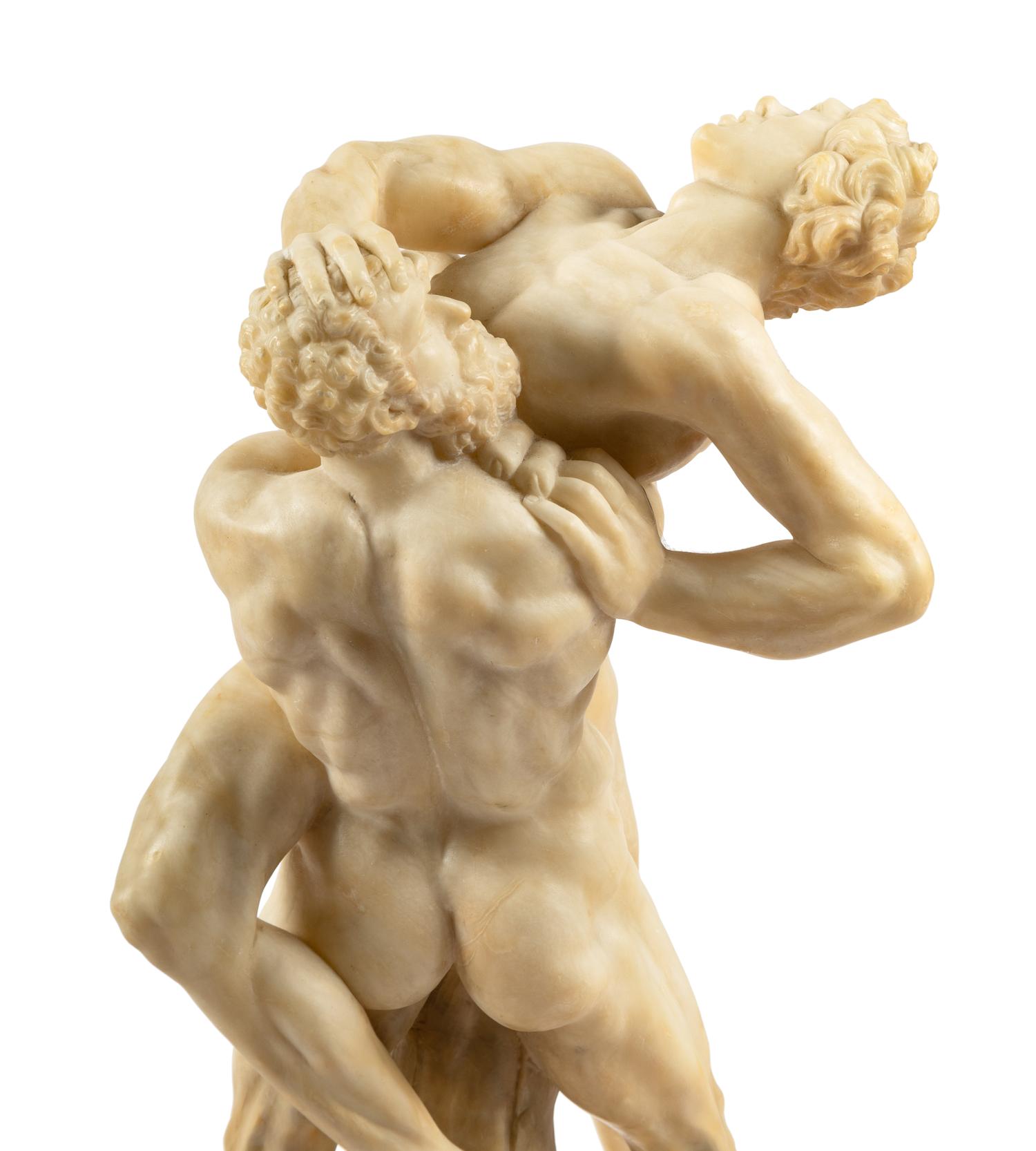 A Continental Carved Alabaster Figural Group Depicting Hercules and Antaeus