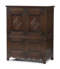 A Jacobean Style Carved Oak Cabinet