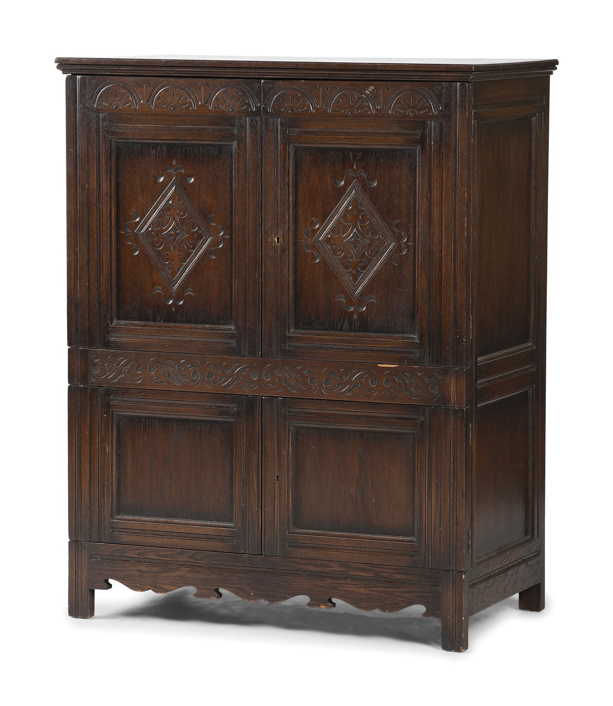 A Jacobean Style Carved Oak Cabinet