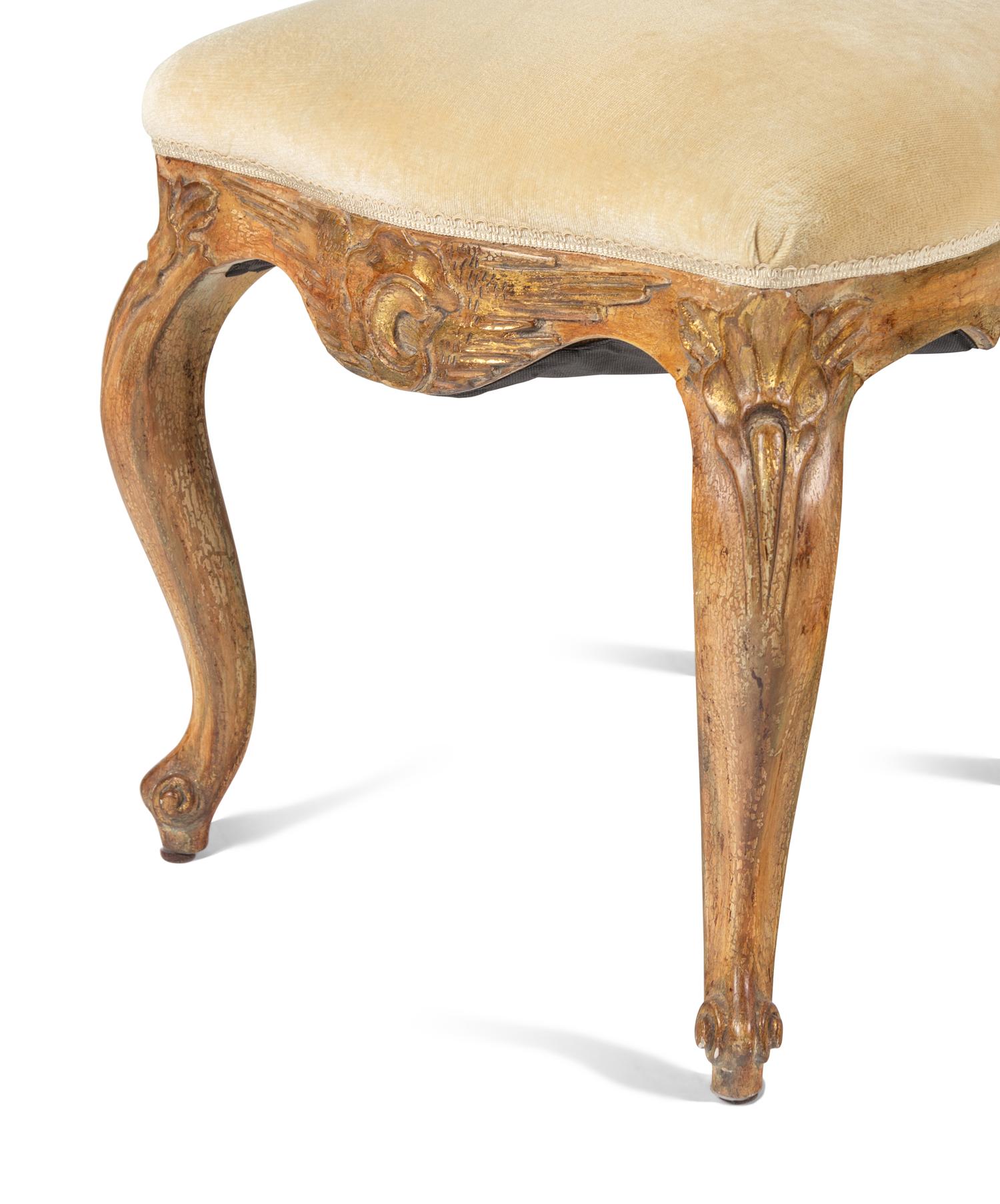 A Set of Ten Italian Rococo Style Painted Dining Chairs