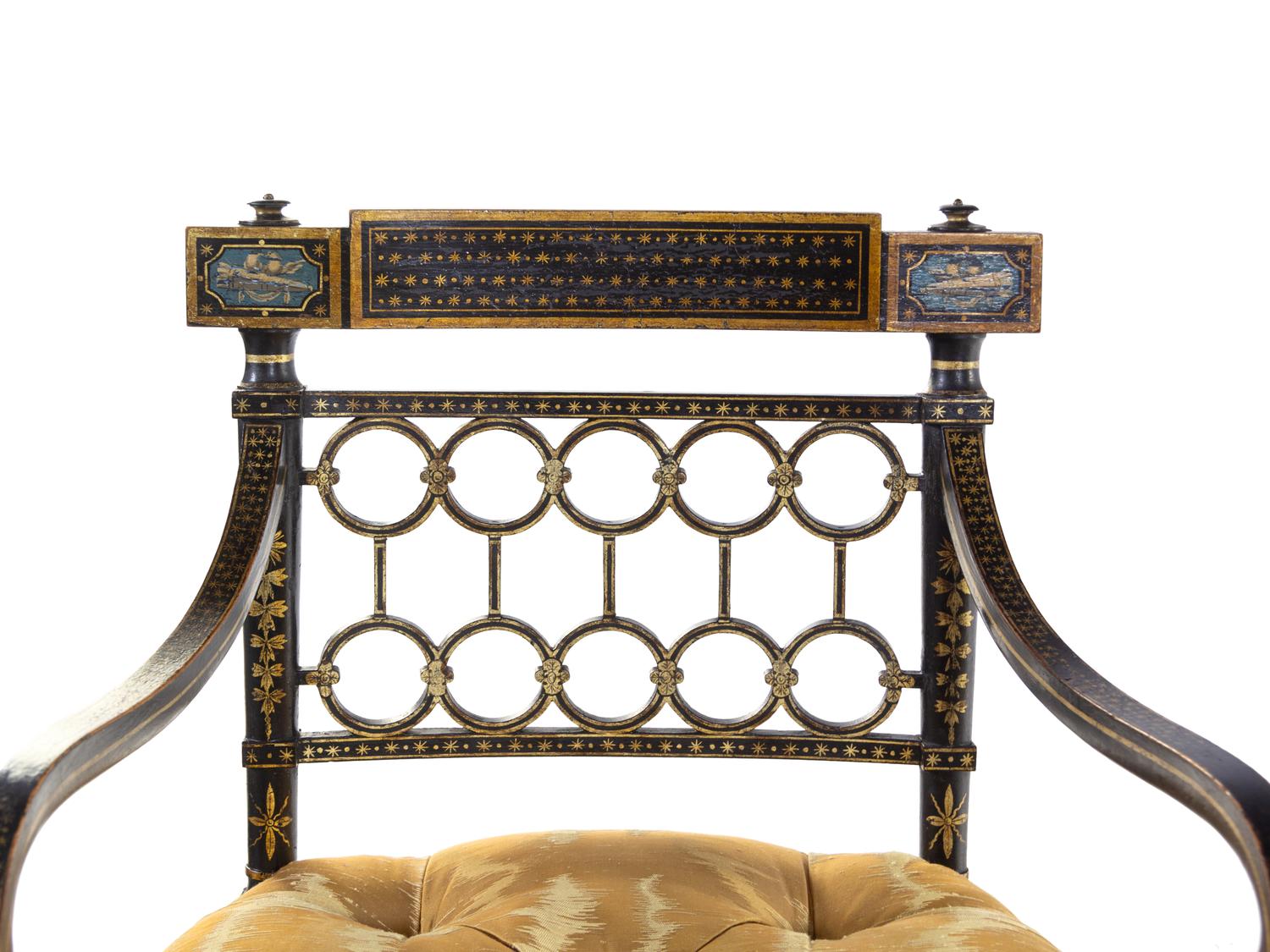 A Pair of Regency Style Gilt and Black Lacquered Armchairs