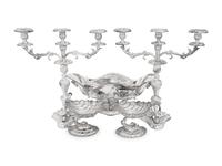 A Silver-Plate Dolphin Form Table Garniture