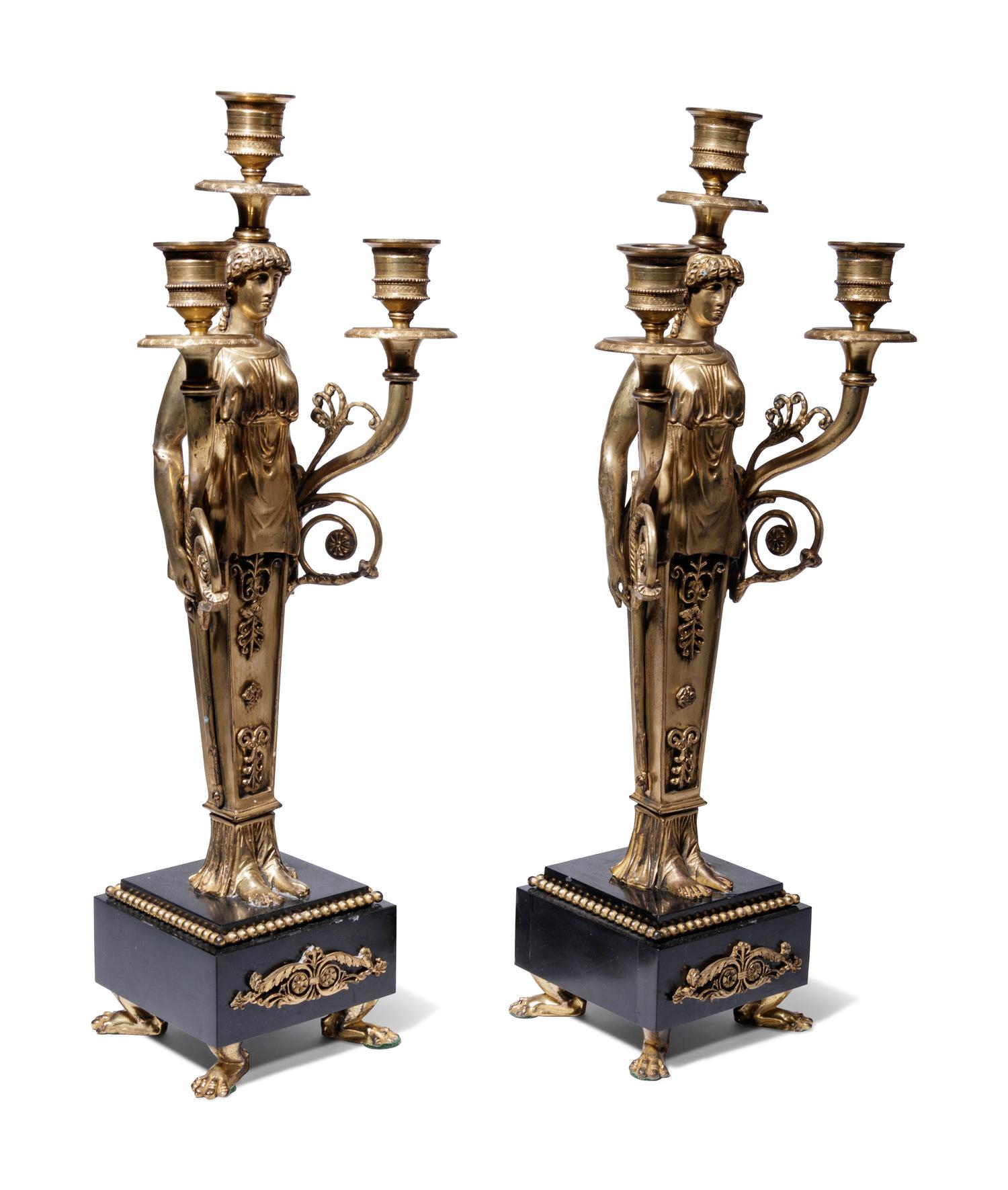 A Pair of Empire Style Gilt Bronze Figural Three-Light Candelabra