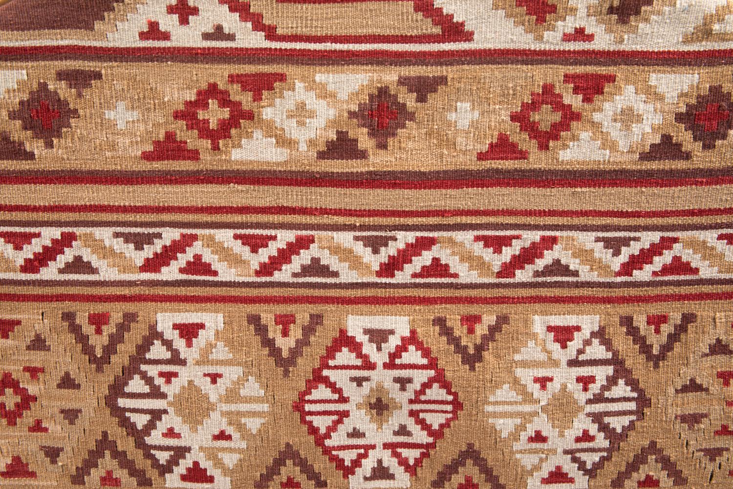 A Pair of Paul Robert Southwestern Style Leather and Kilim Upholstered Armchairs