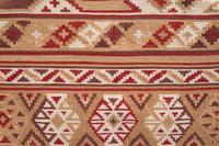 A Pair of Paul Robert Southwestern Style Leather and Kilim Upholstered Armchairs
