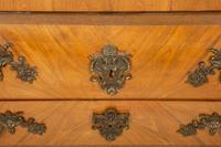 A Louis XV Style Gilt Bronze Mounted Marble-Top Bombe Commode