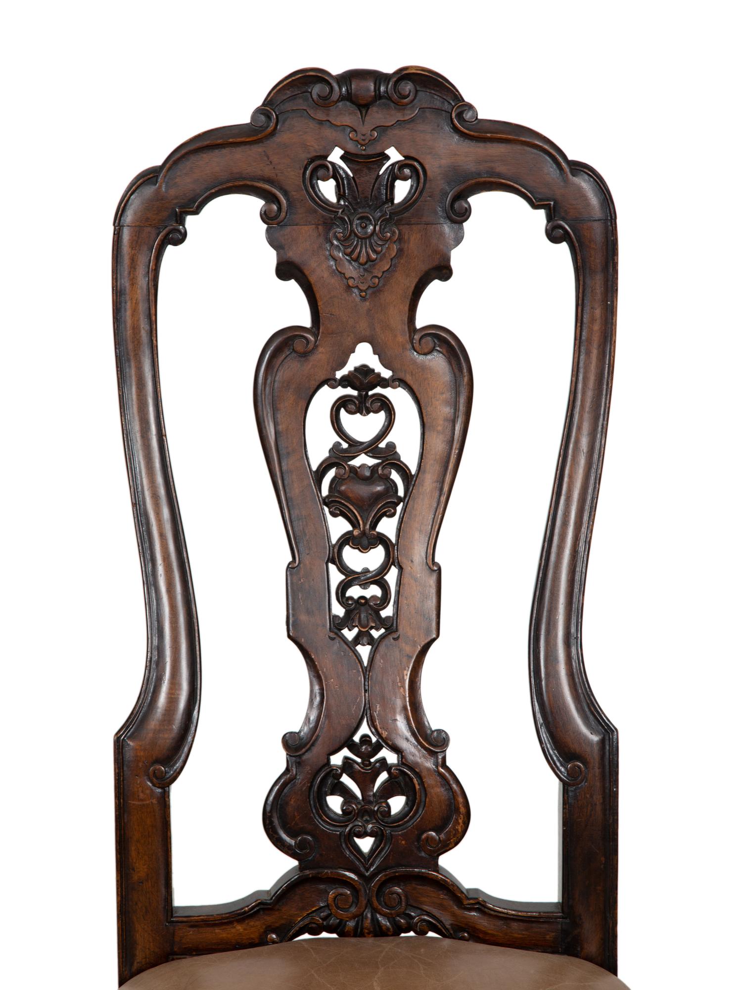 A Set of Six Continental Walnut Dining Chairs