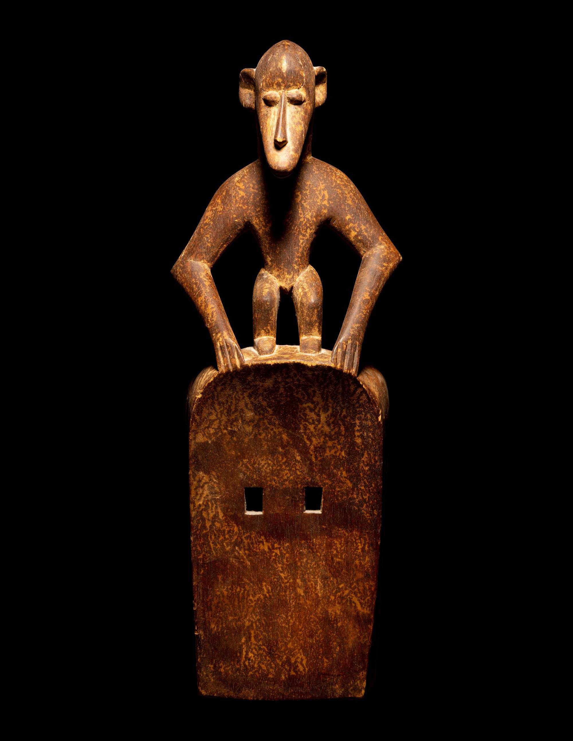 Two Dogon Wood Masks with Figures