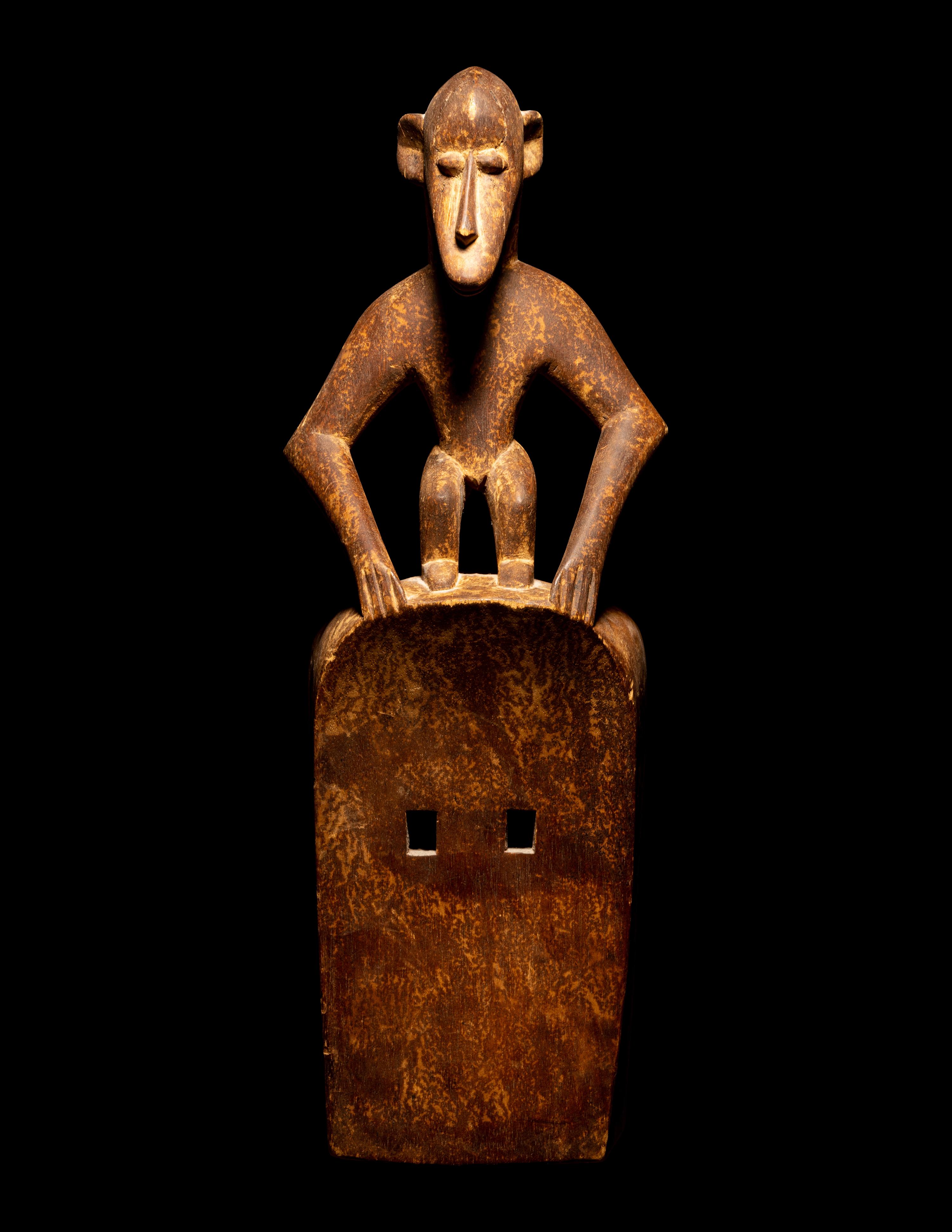 Two Dogon Wood Masks with Figures