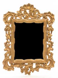 An Italian Giltwood Mirror, Height 35 x width 36 inches.
