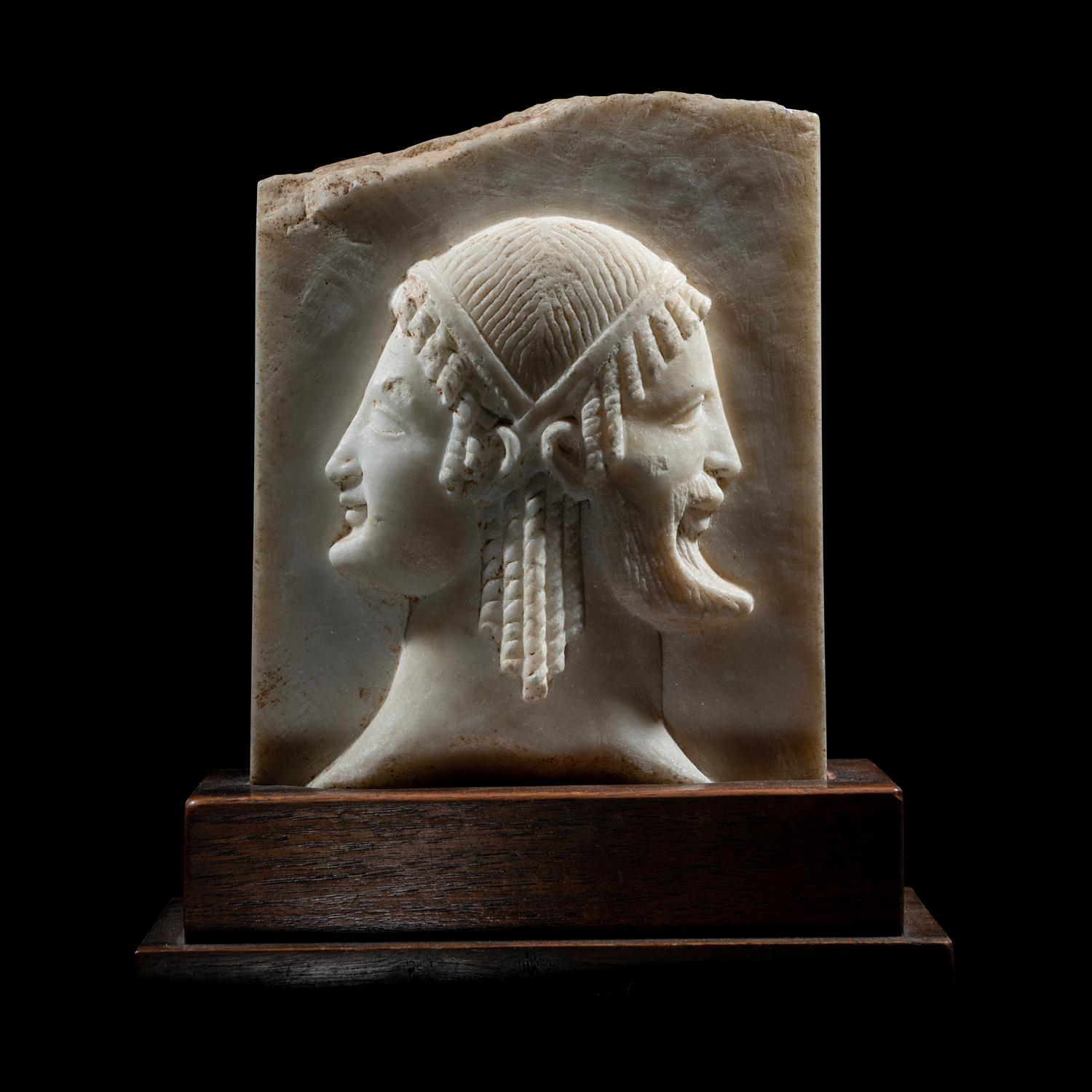 A Neoclassical Marble Relief Fragment with Janus