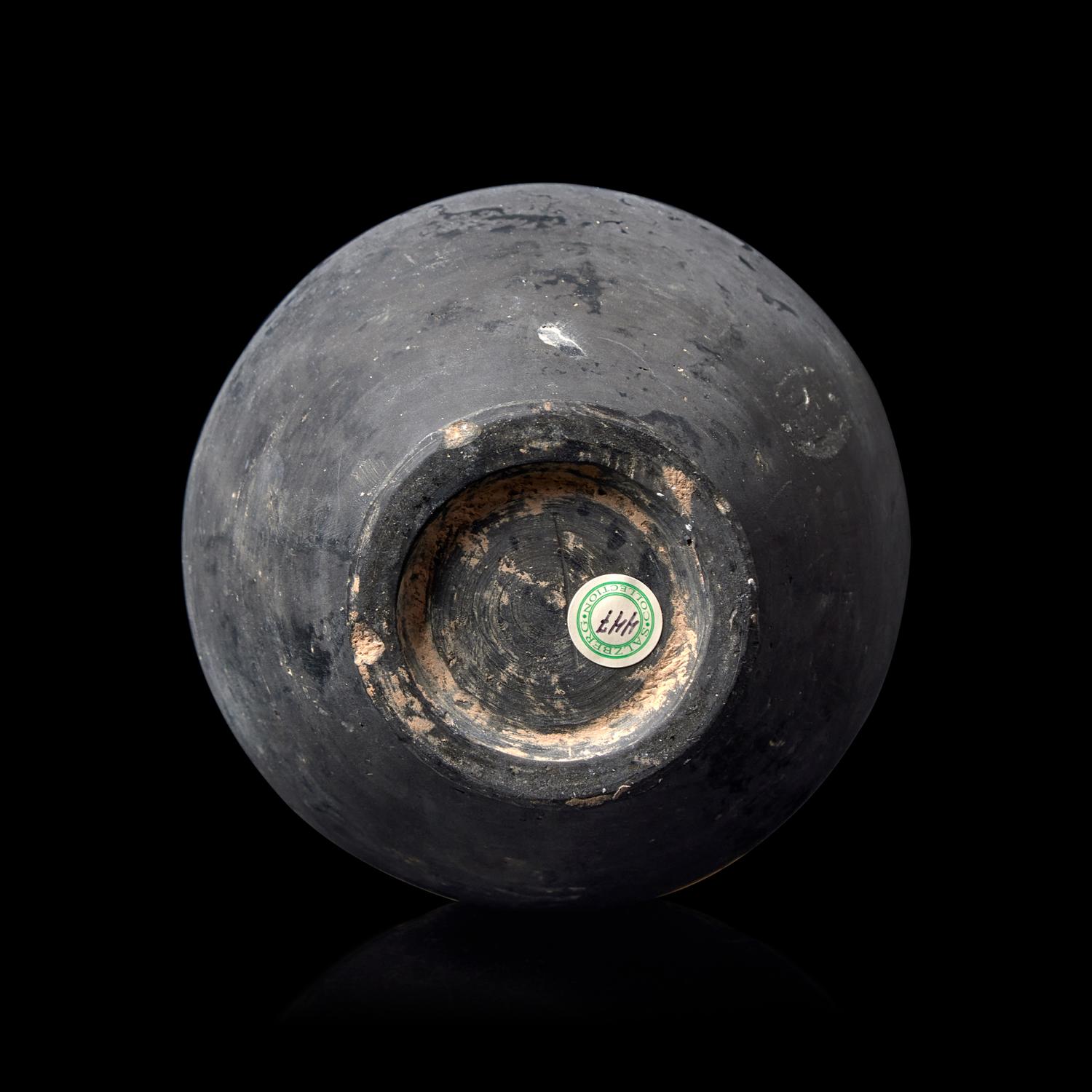 A Chinese Burnished Blackware Vase, Tang Dynasty 唐 黑陶長頸瓶